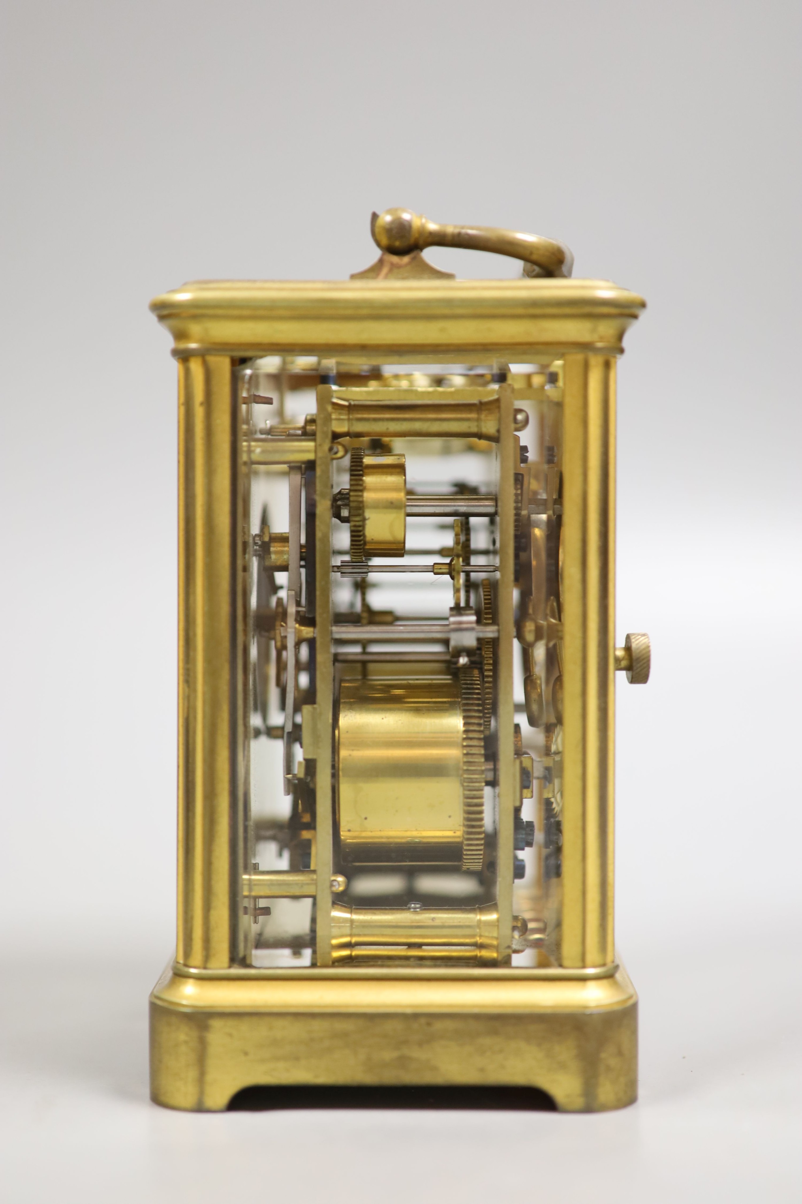 An early 20th century French brass carriage clock with alarm, 16cm high handle up, cased